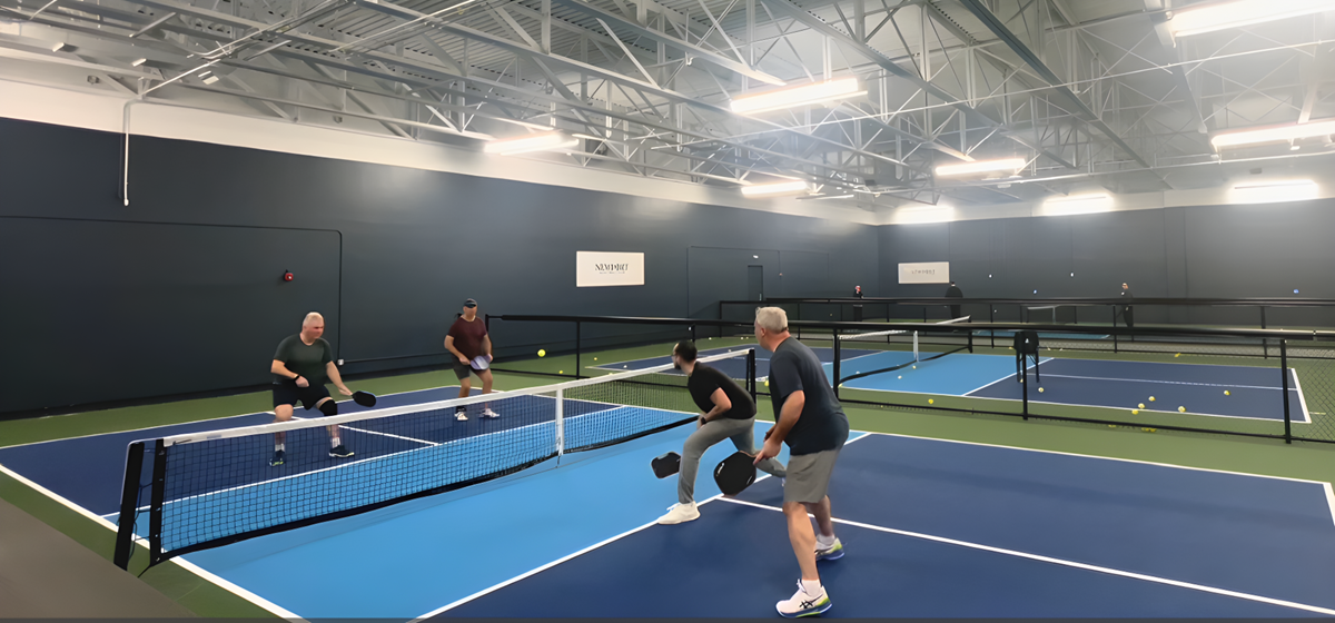 A pickleball player about to poach a ball, opening up expectations and patterns to manipulate later in the game.