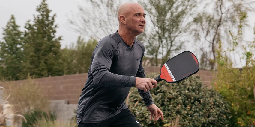 Andre Agassi plays with his signature JOOLA pickleball paddle.