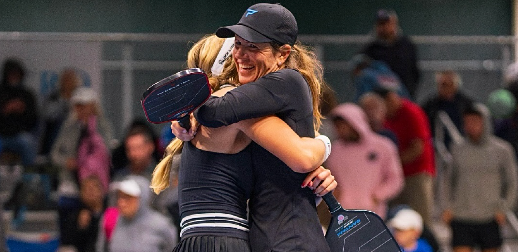 Leigh Waters and Anna Leigh Waters celebrate after a win