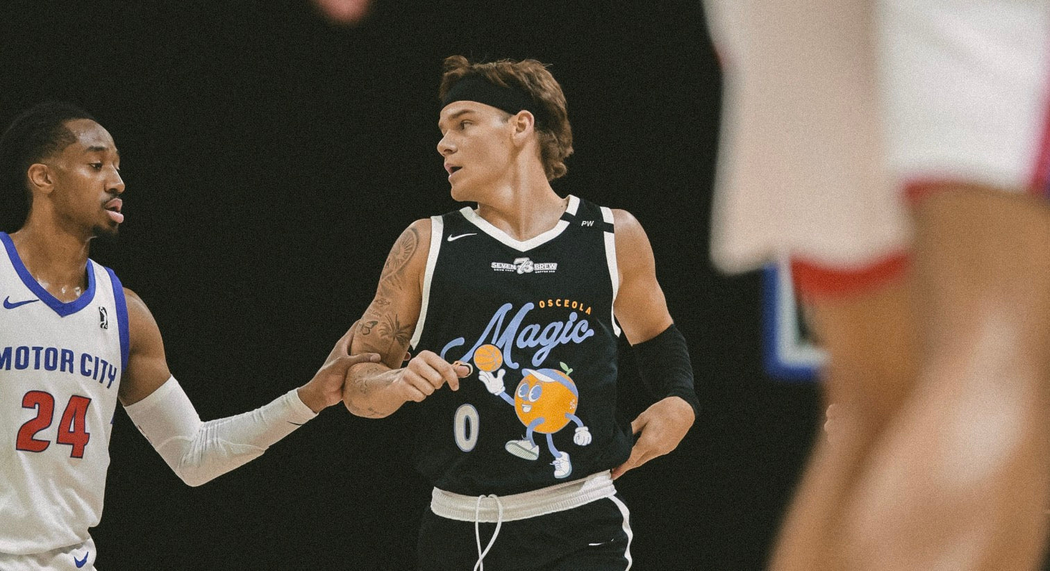An Osceola Magic player wears a pickleball-themed jersey as part of a collab with the Orlando Squeeze Major League Pickleball team.