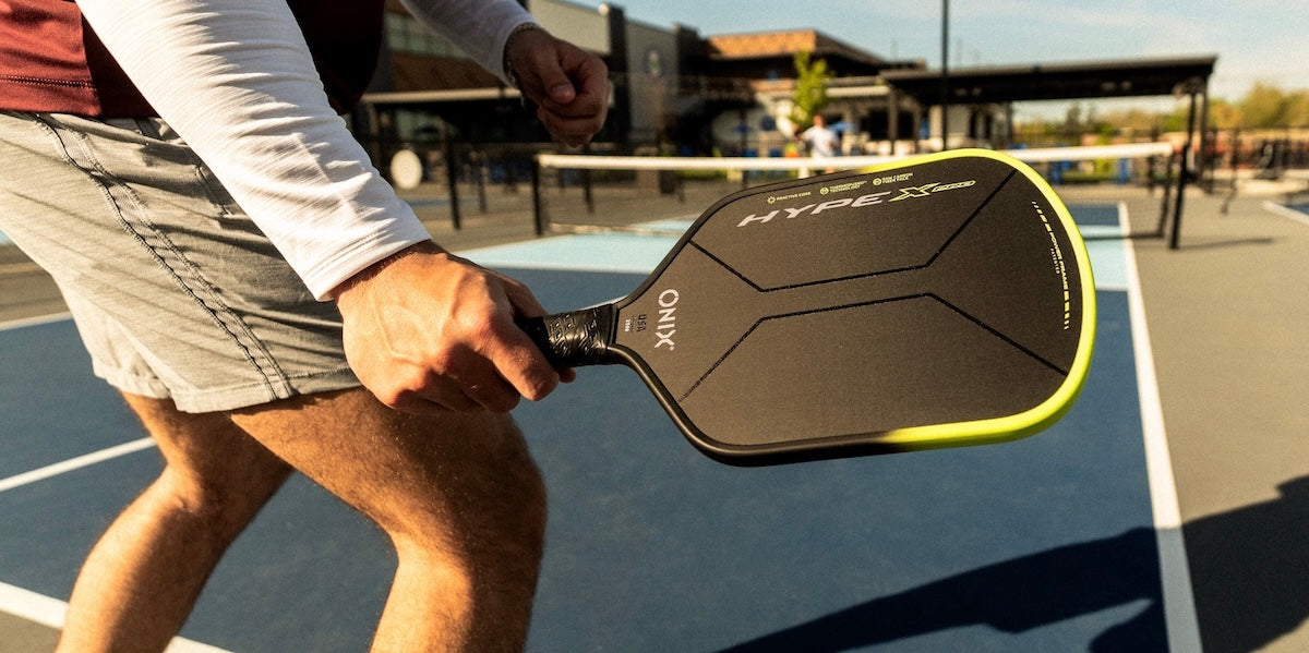 A pickleball player plays with the new ONIX Hype X Pro paddle.