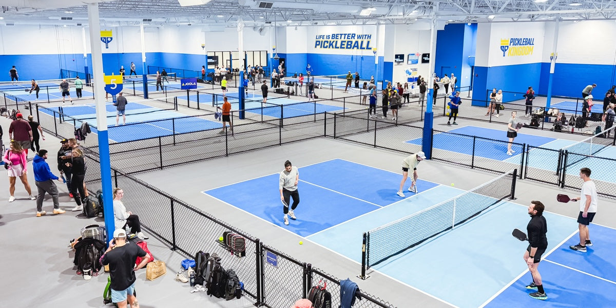 Pickleball players play at a Pickleball Kingdom facility.