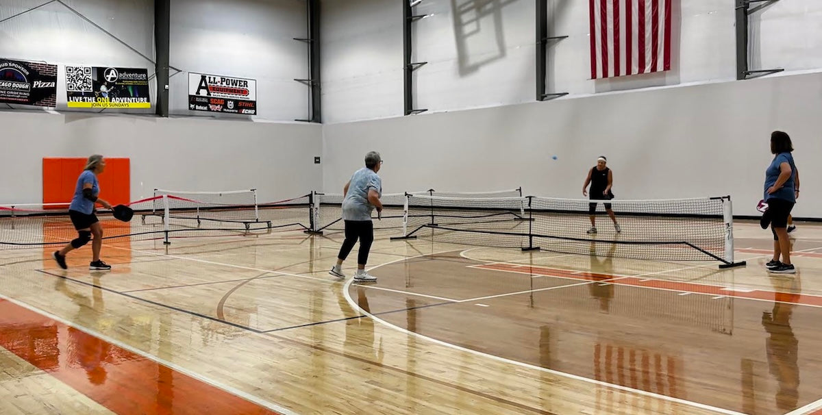 Pickleball players play a game at a Adventure Commons church in south suburban Chicago.