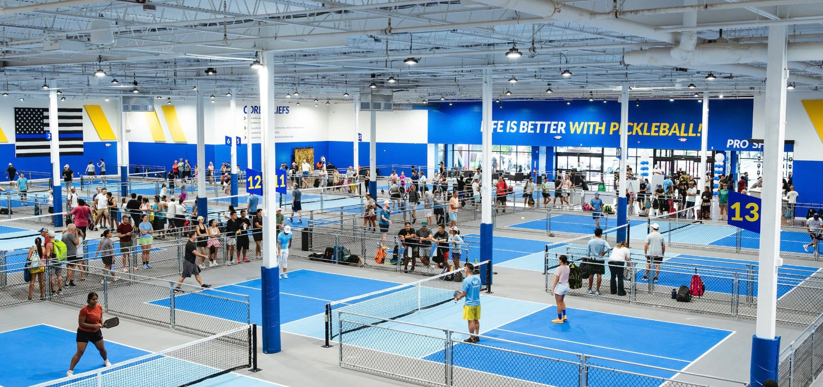 Pickleball players play at a Pickleball Kingdom location