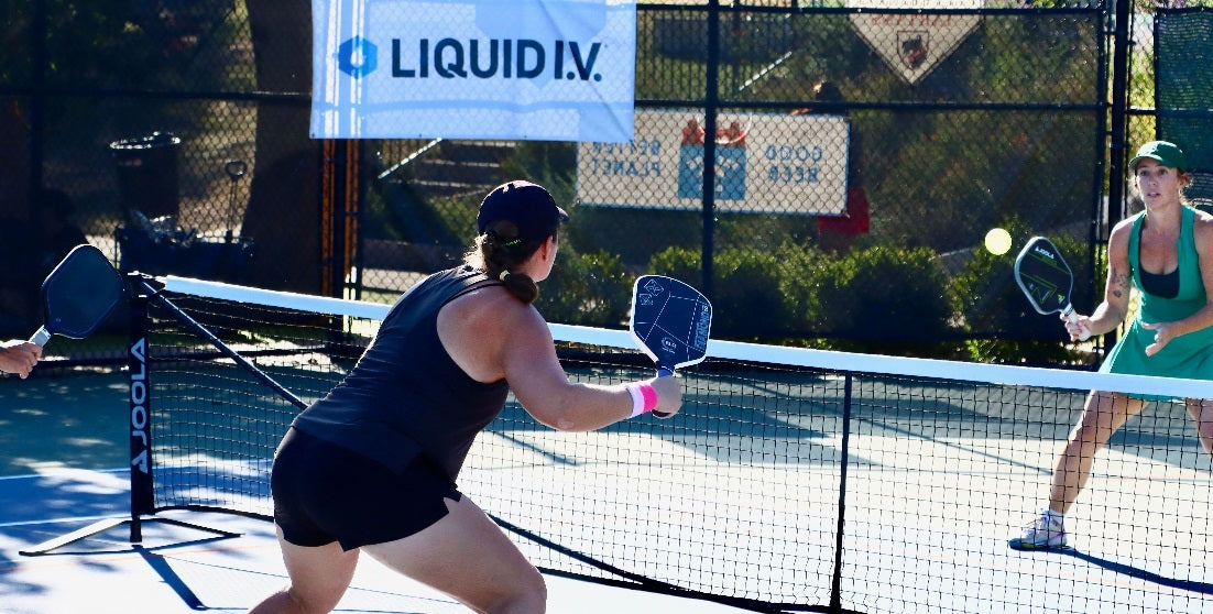A pickleball player deciding on the timing of their next shot