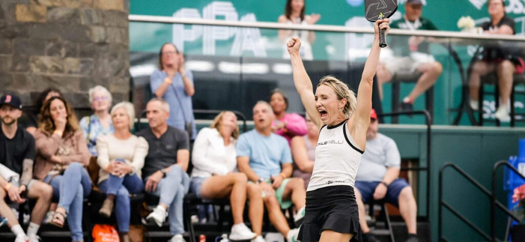 Allyce Jones, pro pickleball player, celebrates after winning a point.