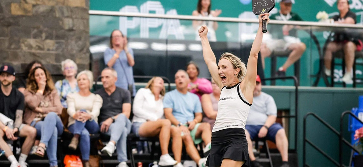 Allyce Jones, pro pickleball player, celebrates after winning a point.