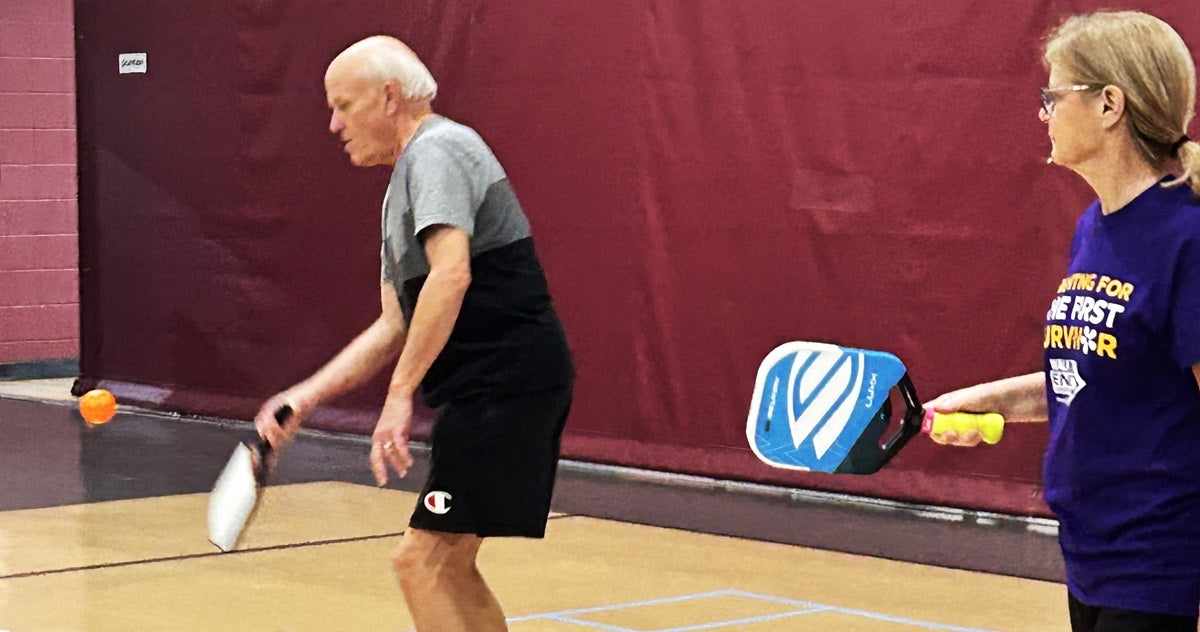 An Alzheimer's patient plays pickleball