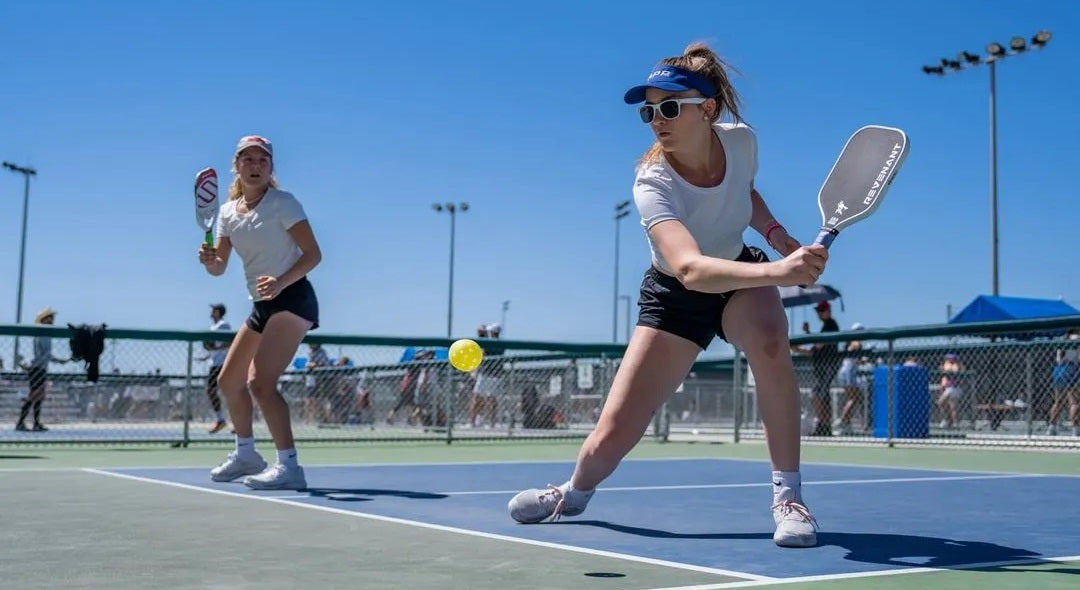 A pickleball doubles team plays during a charitable pickleball fundraising event
