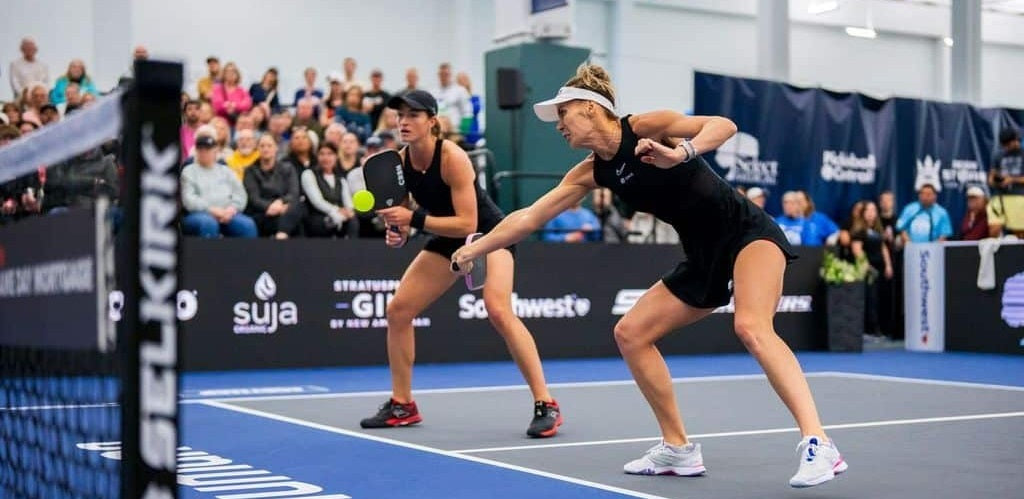Improving in pickleball can't just involve playing, like the players in this photograph are.