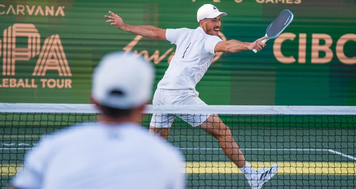 Federico Staksrud just aftermaking contact with the ball in a singles pickleball match.