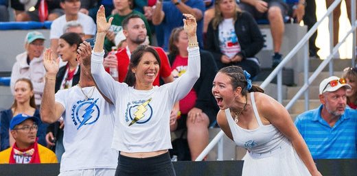 Members of the Dallas Flash MLP team celebrate after a point victory
