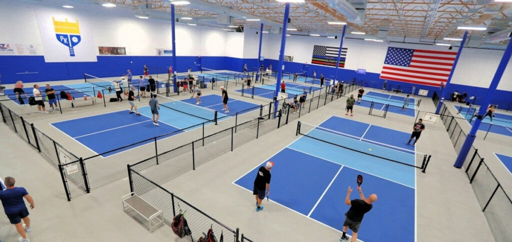 Inside an indoor pickleball facility