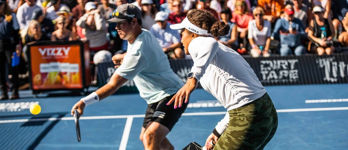 Rafa Hewett, a left-handed pickleball player, covers the middle during a pro pickleball point.