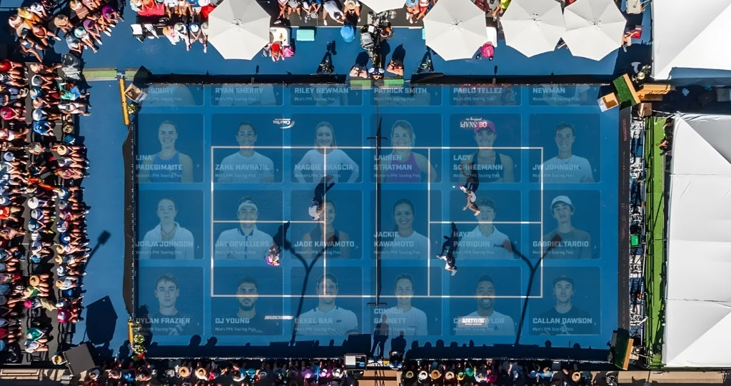 A pickleball court from above with images of the PPA Tour roster superimposed lightly