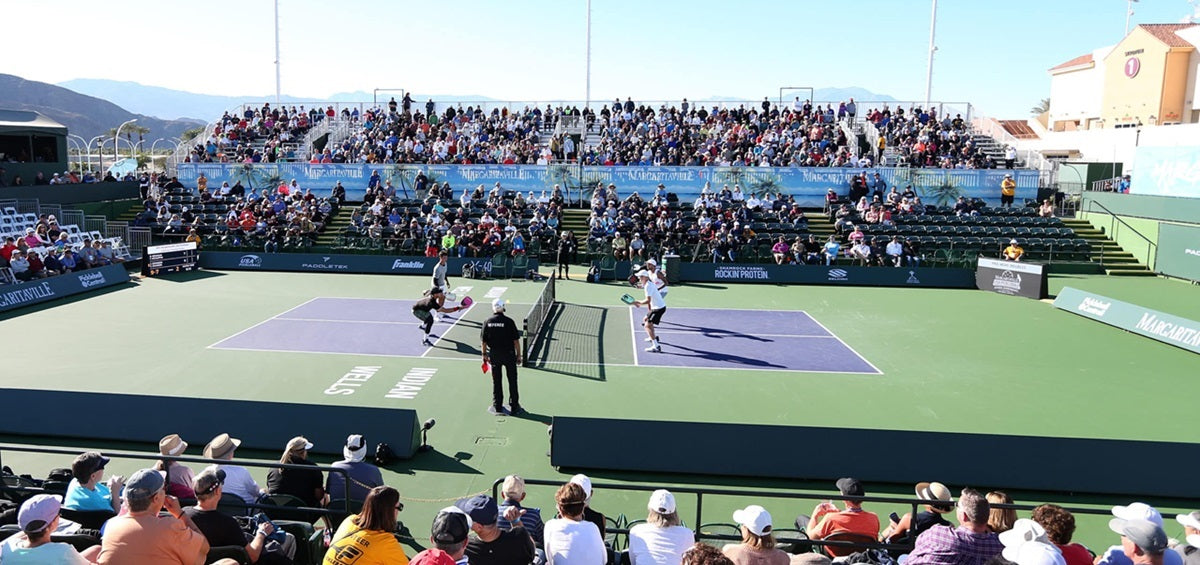 A PPA Tour event, players mid pickleball match
