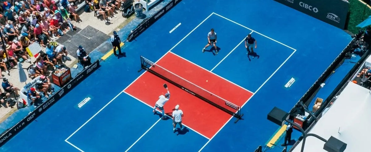 Pickleball players who have clearly practiced their drills face off during a PPA Tour match.