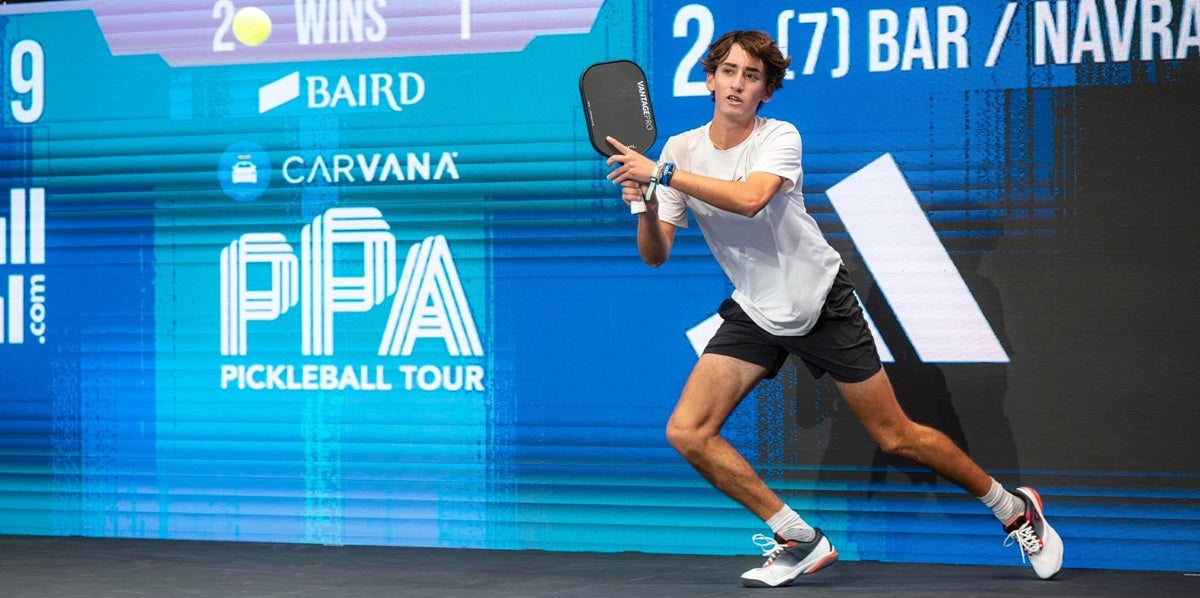 Gabe Tardio returning a serve during a pickleball match