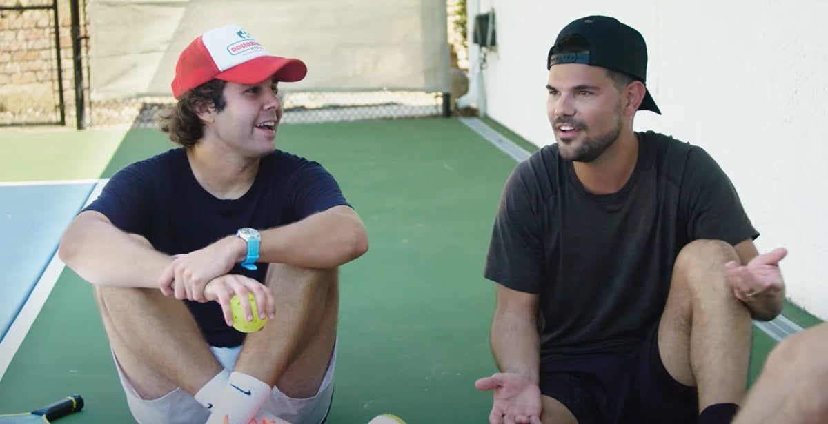 Taylor Lautner (right) joins in an epiosde of the new pickleball show, The Wager
