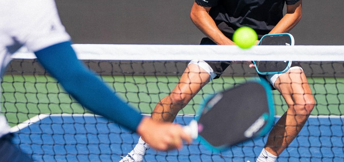 Image of a pickleball in flight after topspin was applied to it by a PPA Tour pro player