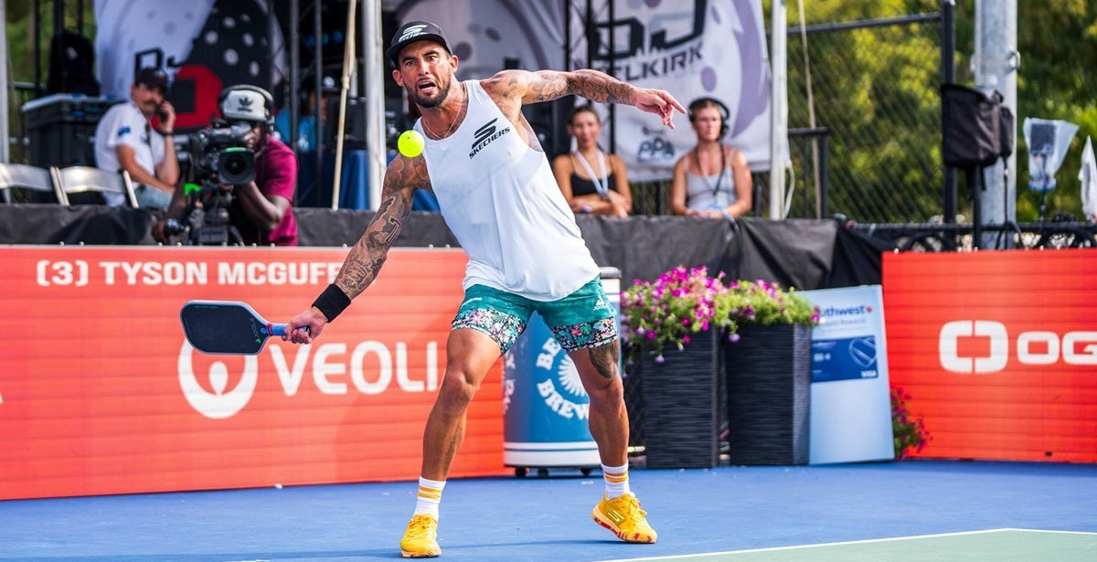 Pro pickleball player Tyson McGuffin about to demonstrate his powerful serve.