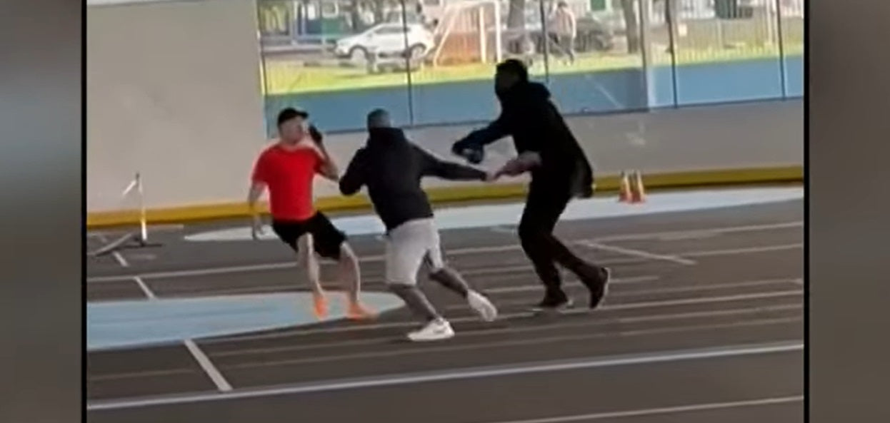 Violent fight happening on a pickleball court
