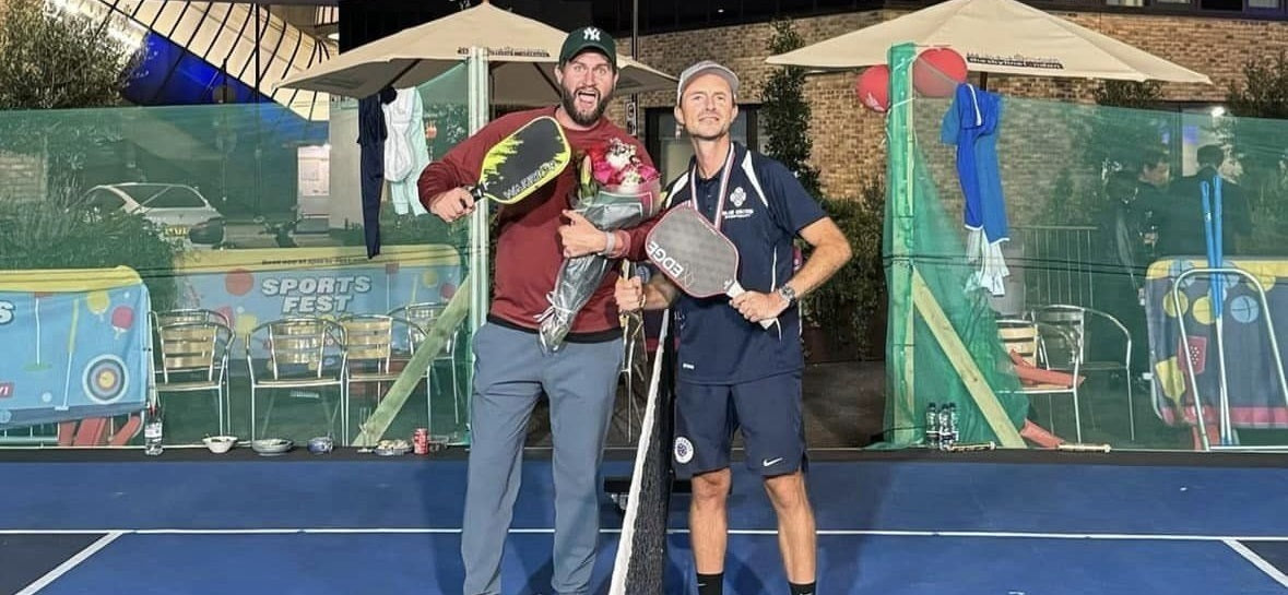Two pickleball world record holders pose in England