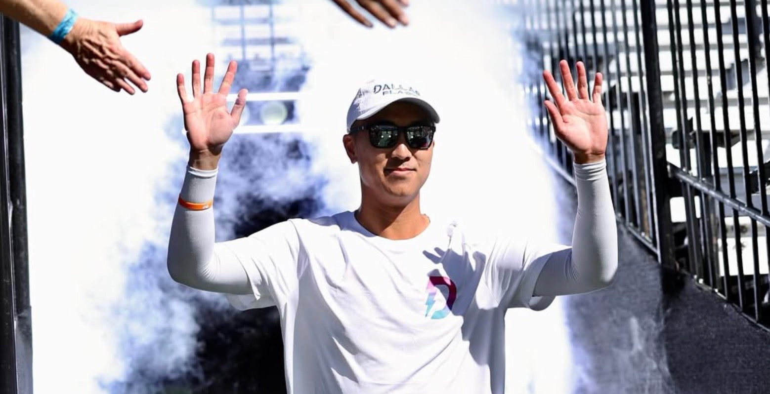 Augie Ge enters the court for a Major League Pickleball match.
