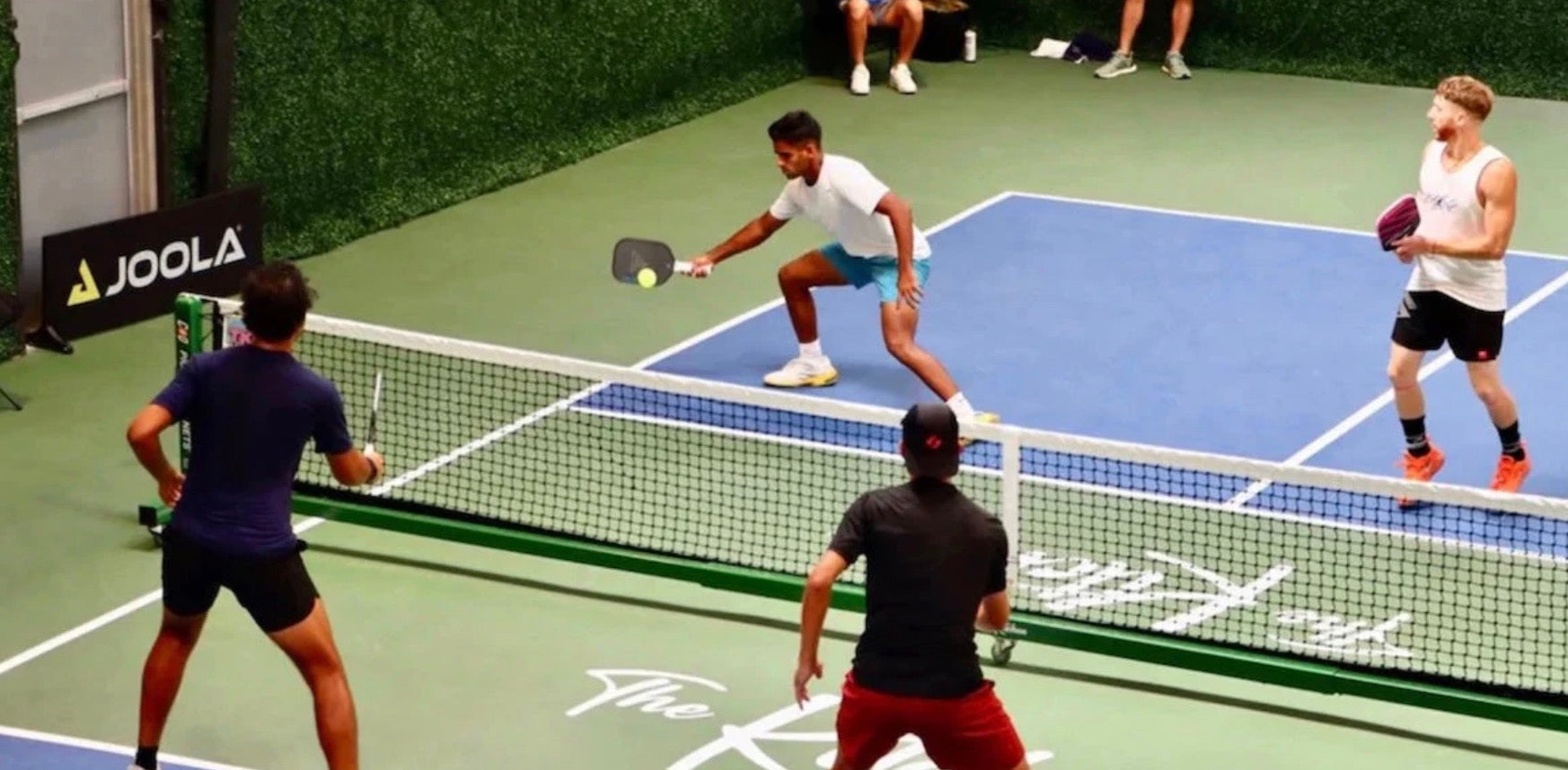 A player executes a dead dink during a tournament at The Kitchen HQ.