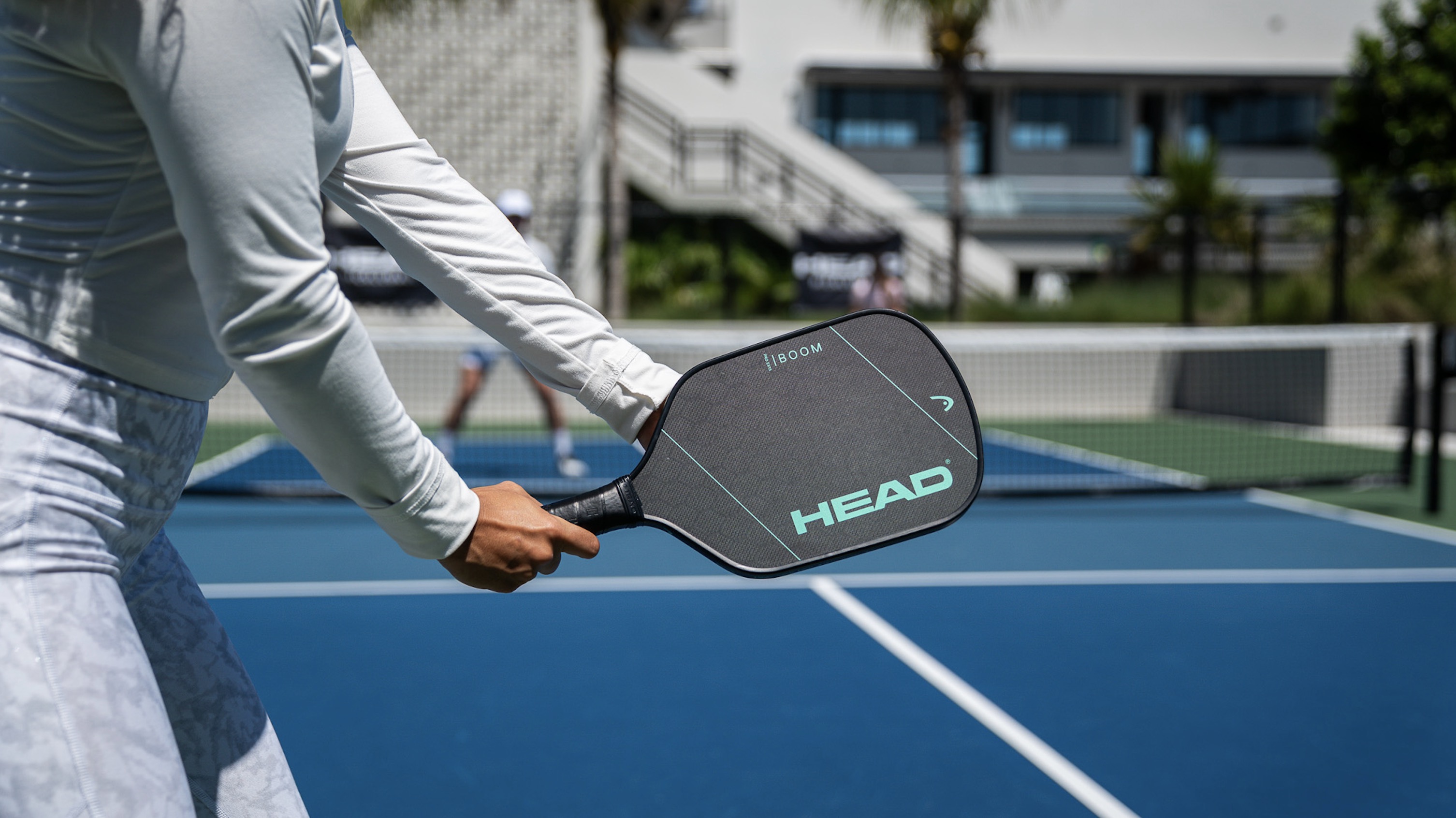 A pickleball player uses the new HEAD Boom Pro EX15 pickleball paddle.
