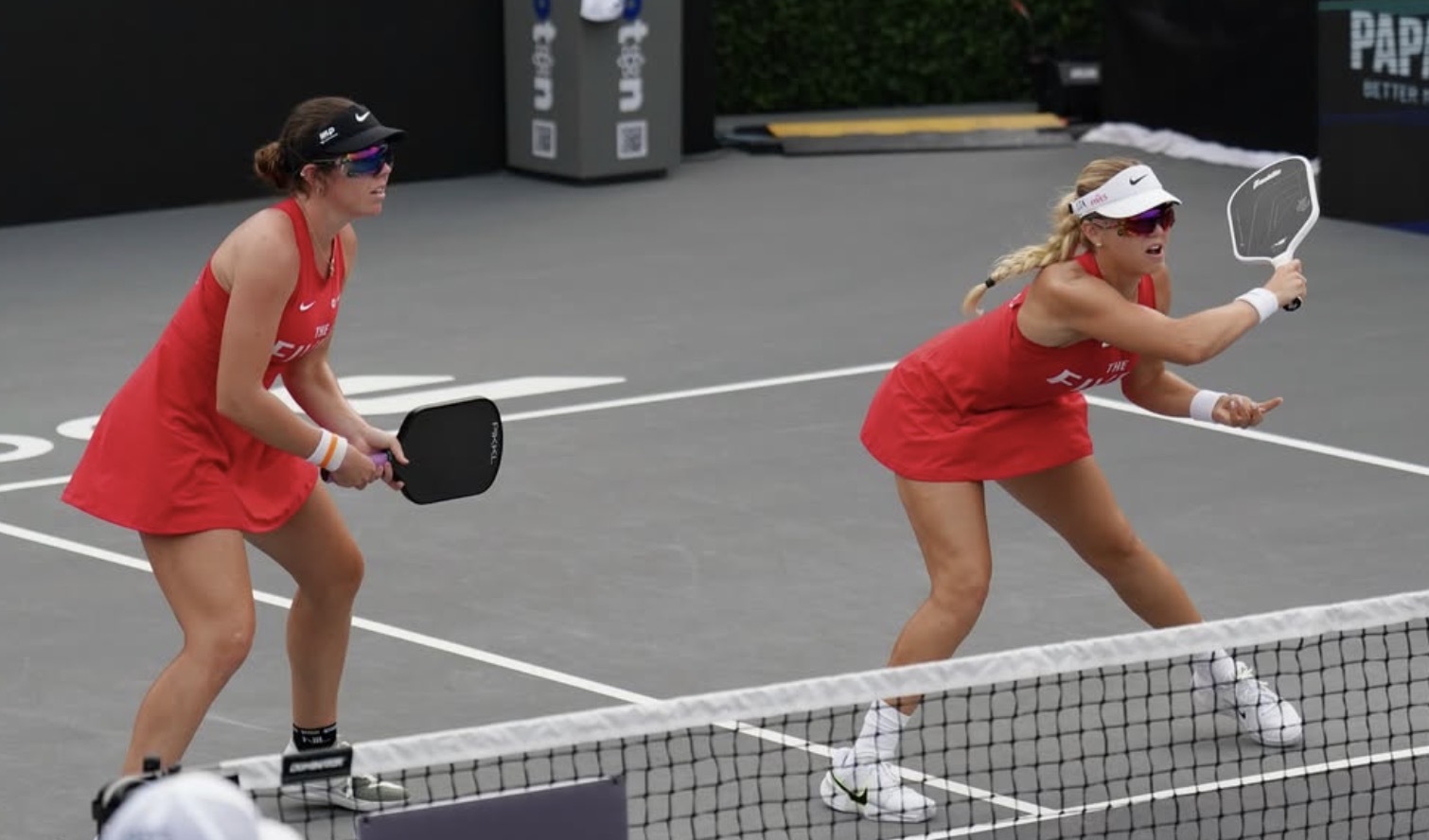 Anna Leigh Waters and Jorja Johnson play a point for the New Jersey 5s during a Major League Pickleball event.