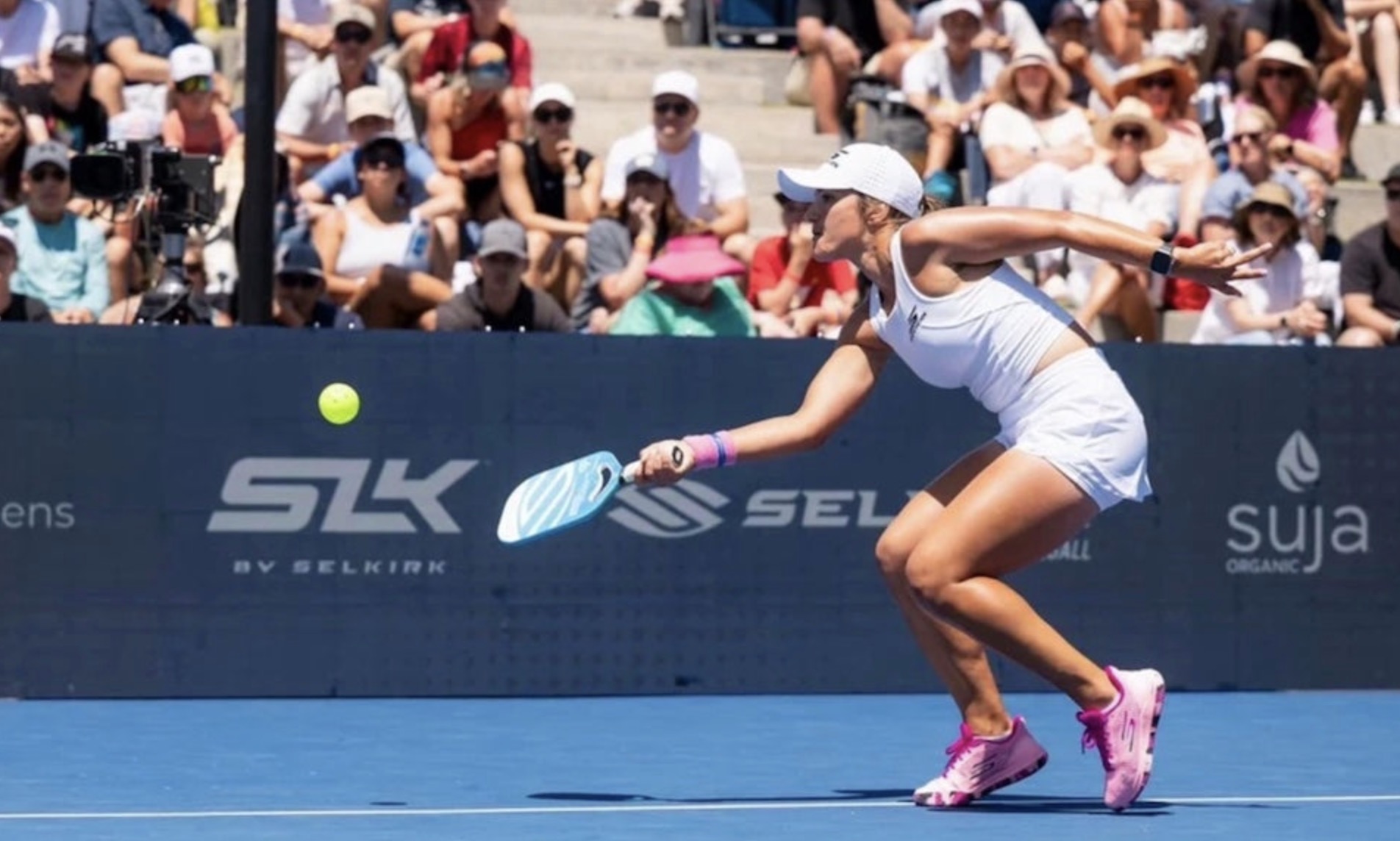 Pro pickleball player Catherine Parenteau hits a reset from the transition zone.