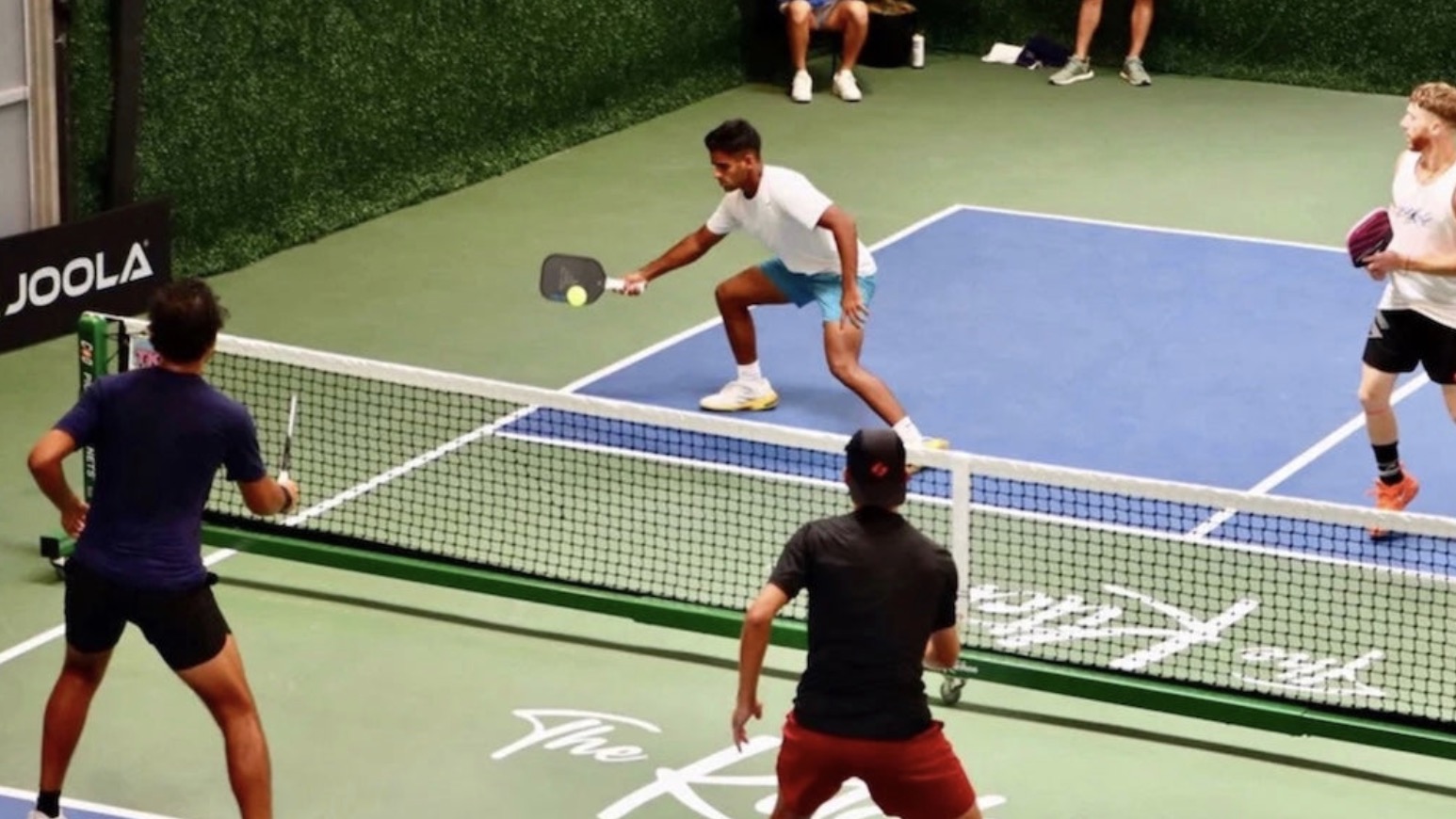 Pickleball players compete at The Kitchen HQ in Austin, Texas.