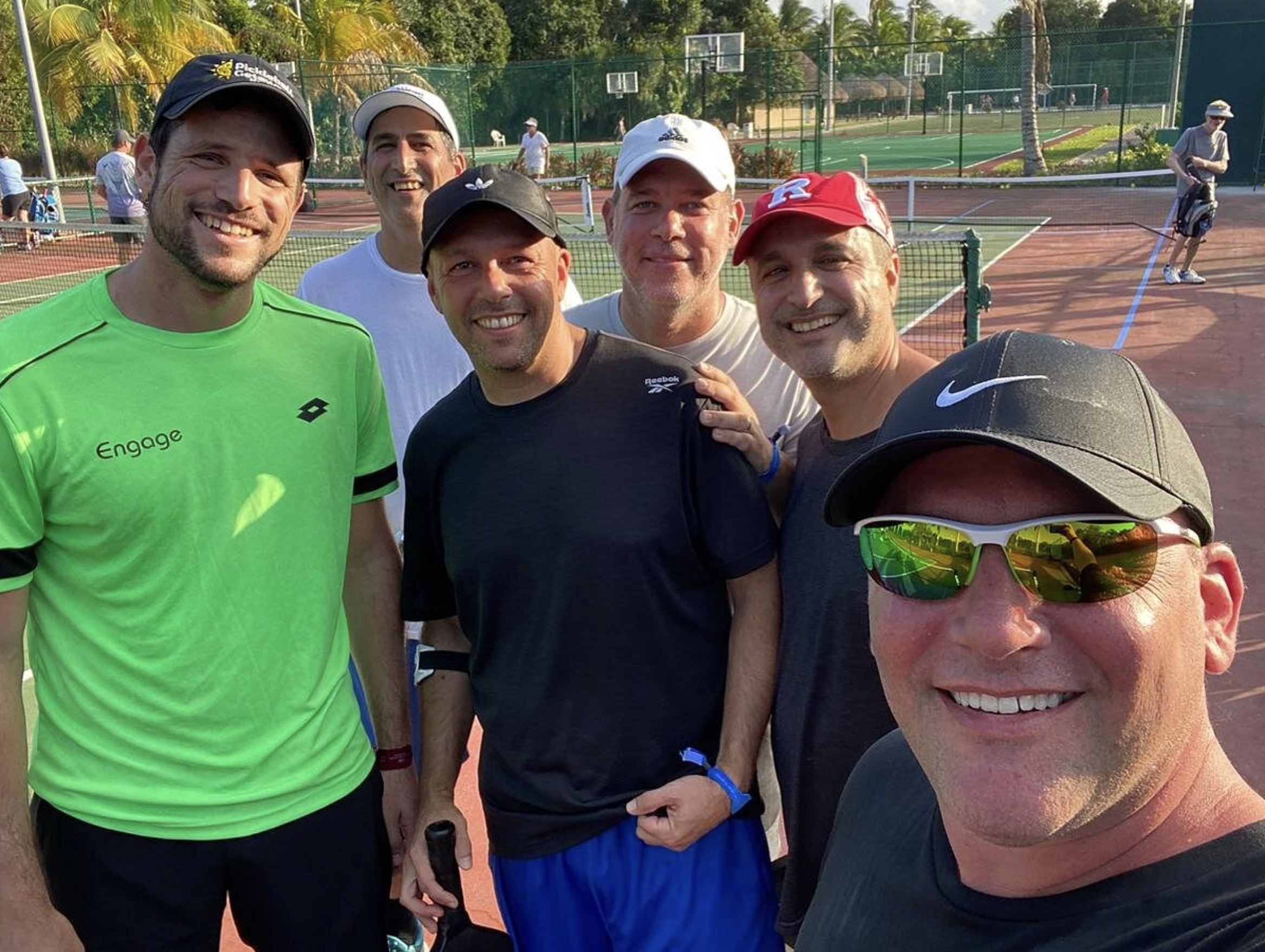 Dekel Bar takes a picture with Pickleball Getaways guests.