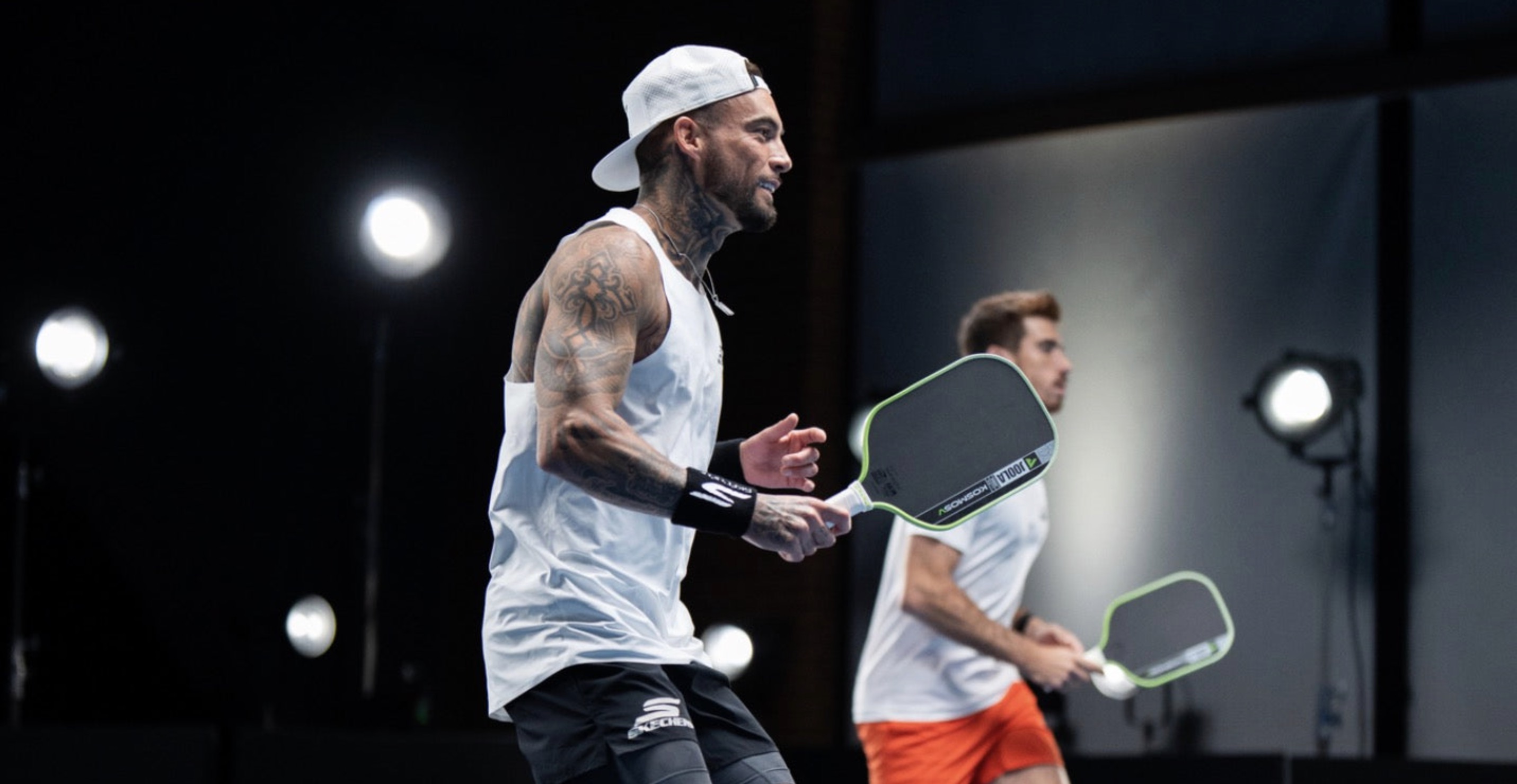 Tyson McGuffin and Federico Staksrud play with their new JOOLA Pro V Kosmos signature paddles.