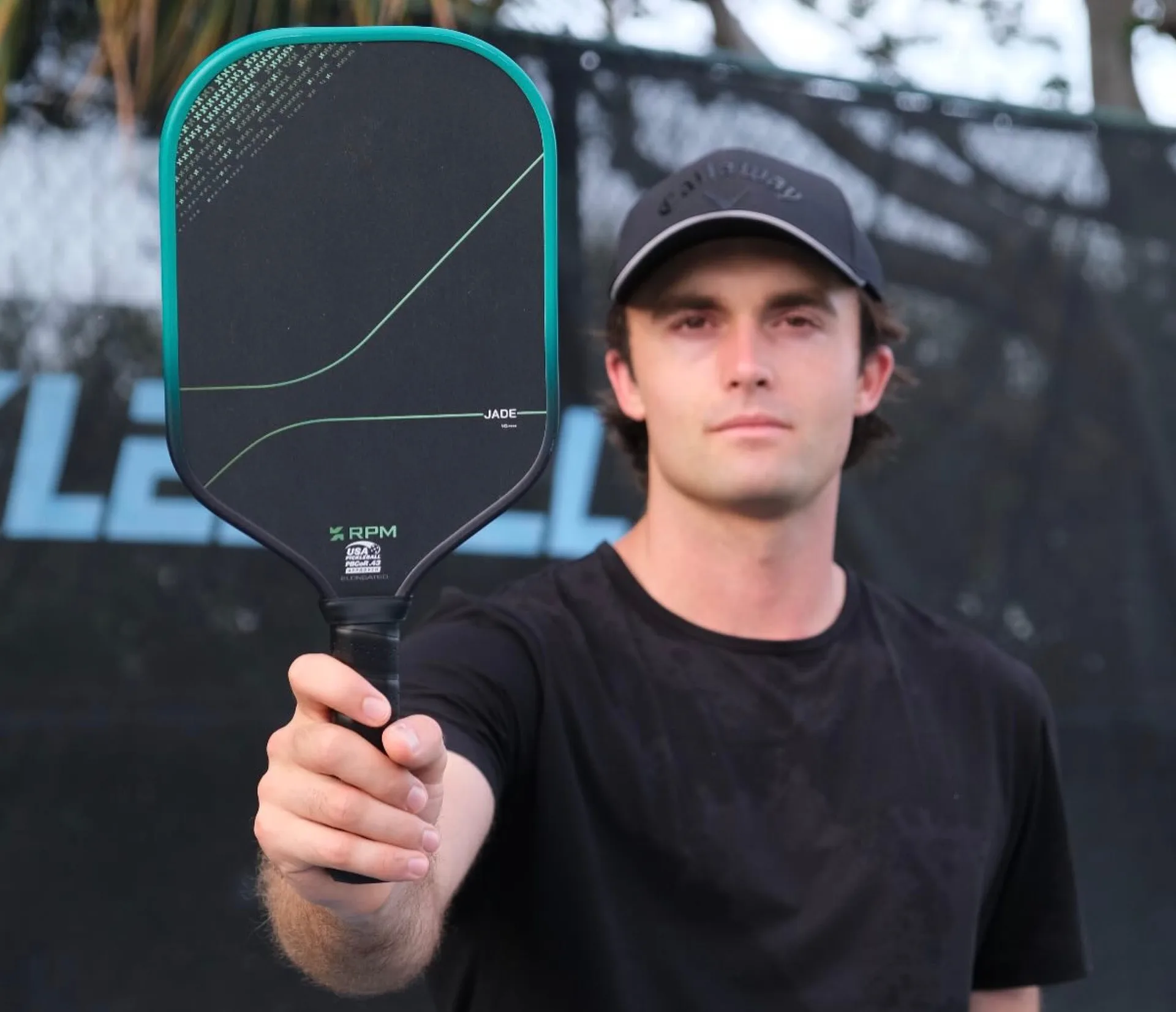 James Ignatowich holds the new RPM Jade pickleball paddle.