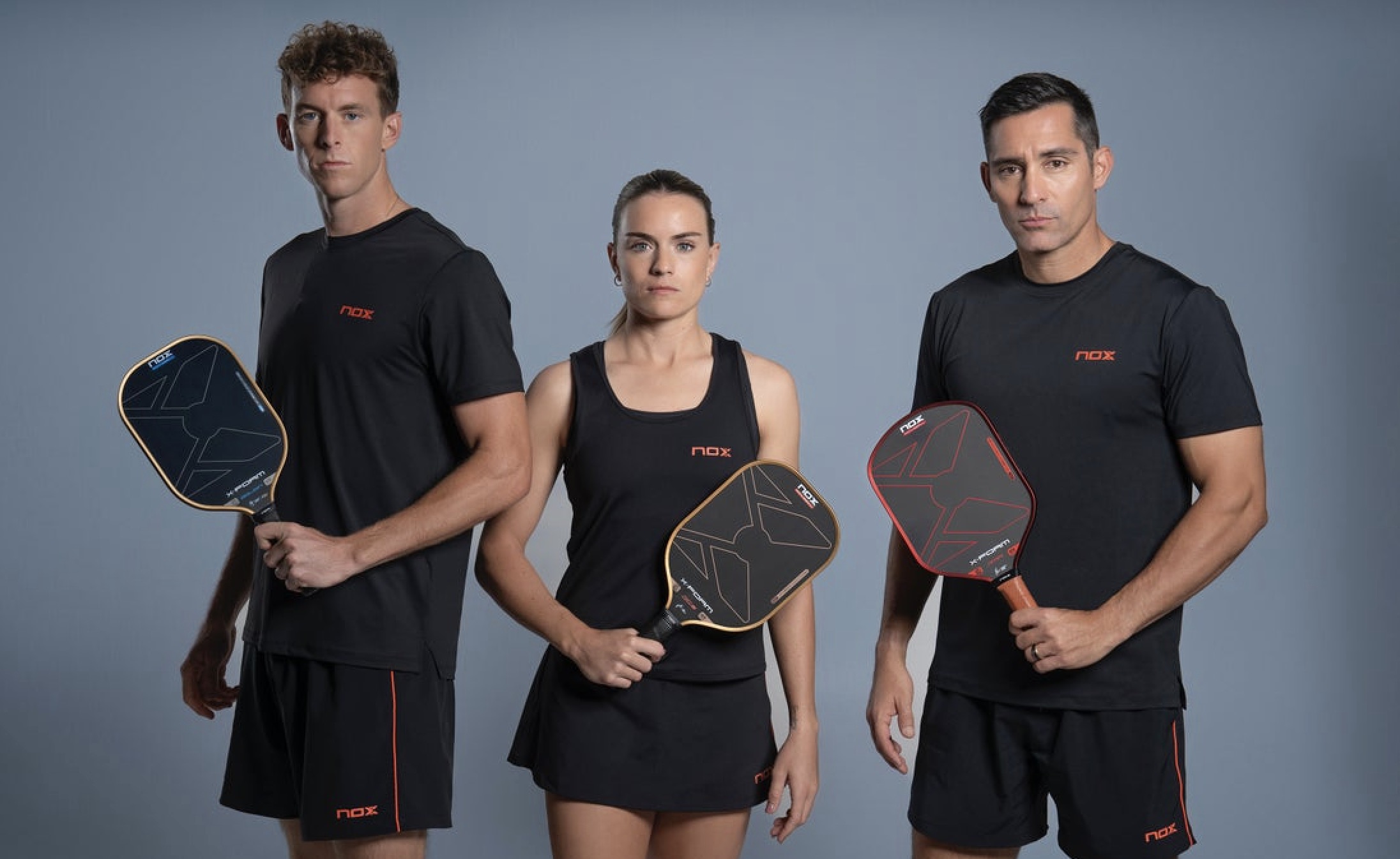 NOX pro pickleball players Grayson Goldin, Judit Castillo and Jhonnatan Medina-Álvarez.